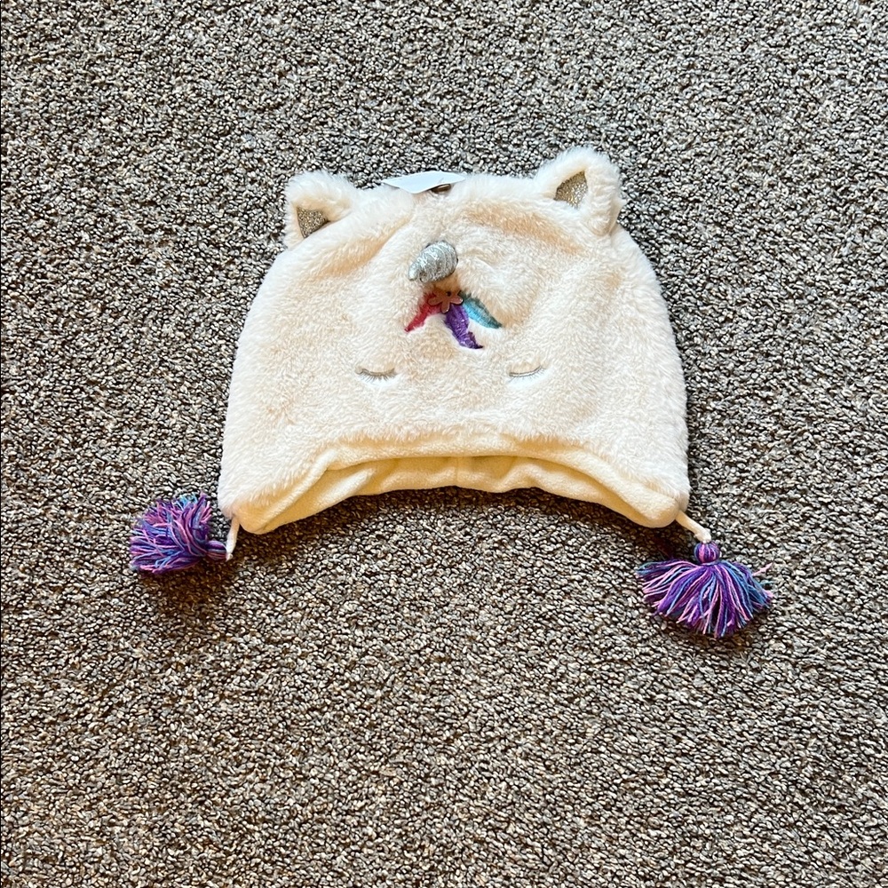 NWT Cream Unicorn Hat with Purple Tassels, 7-12 years